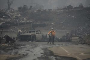 LA fire with man and bicycle